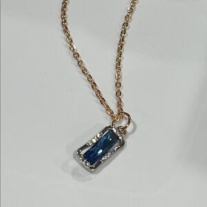 Artisan Gold Necklace with Blue Gemstone